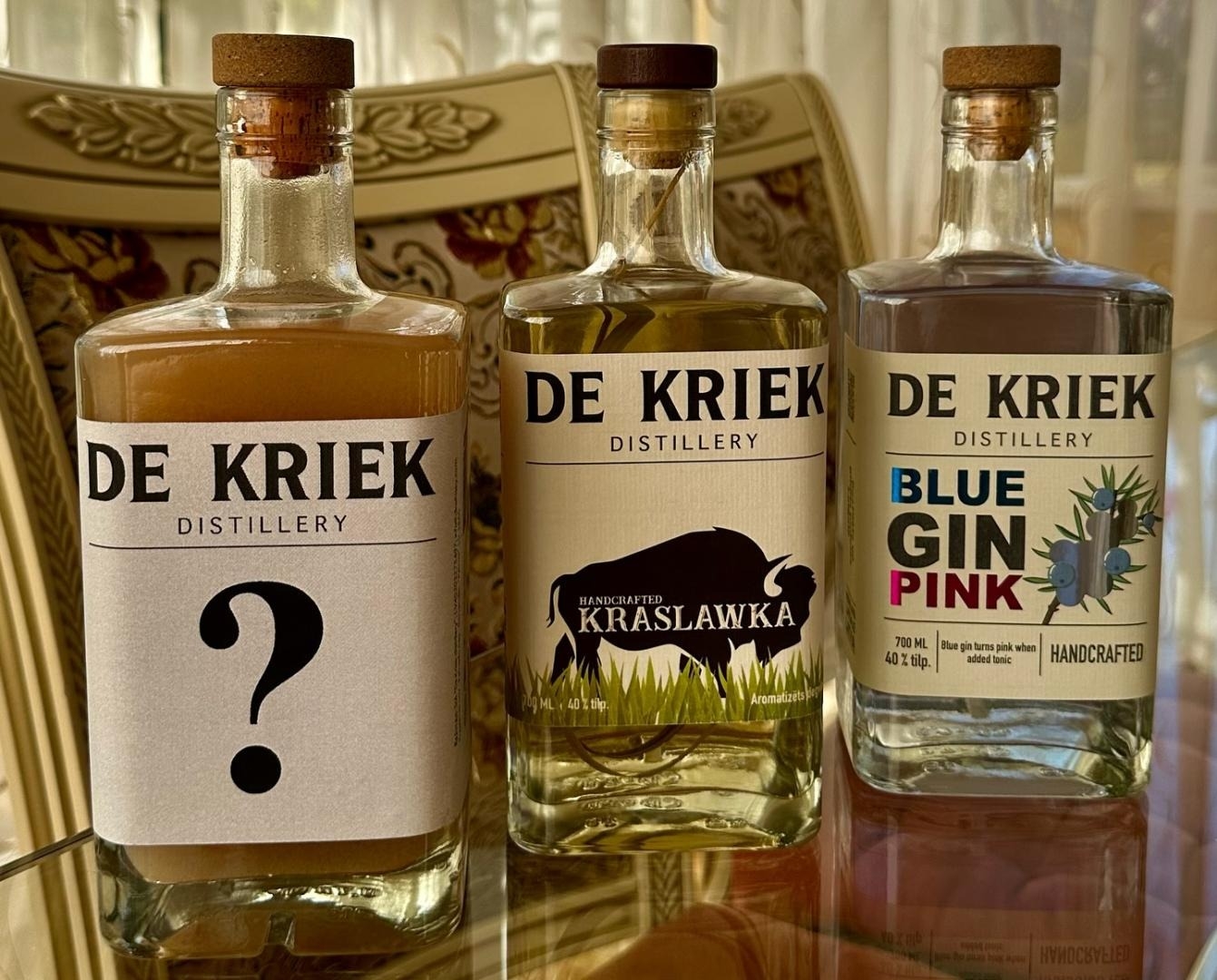 “De Kriek” dzērienu pudeles